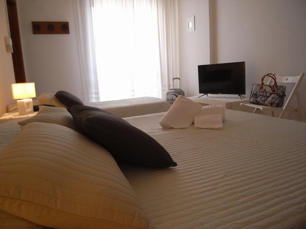 Hotel Moreri Grado Pokoj fotografie