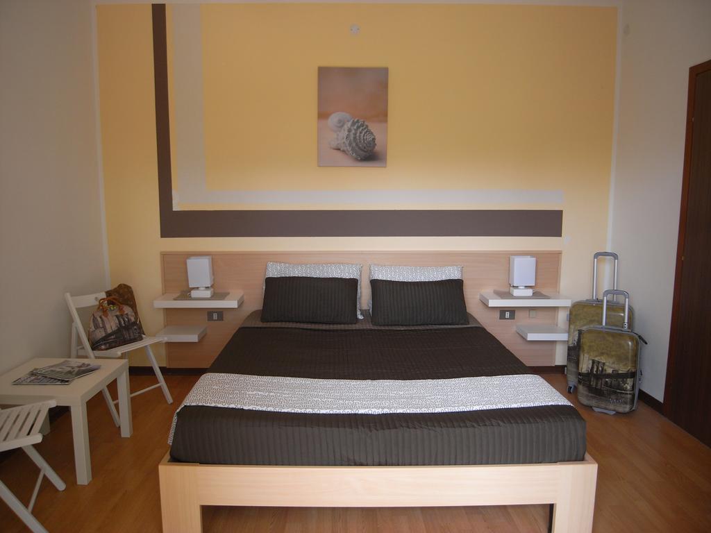 Hotel Moreri Grado Pokoj fotografie